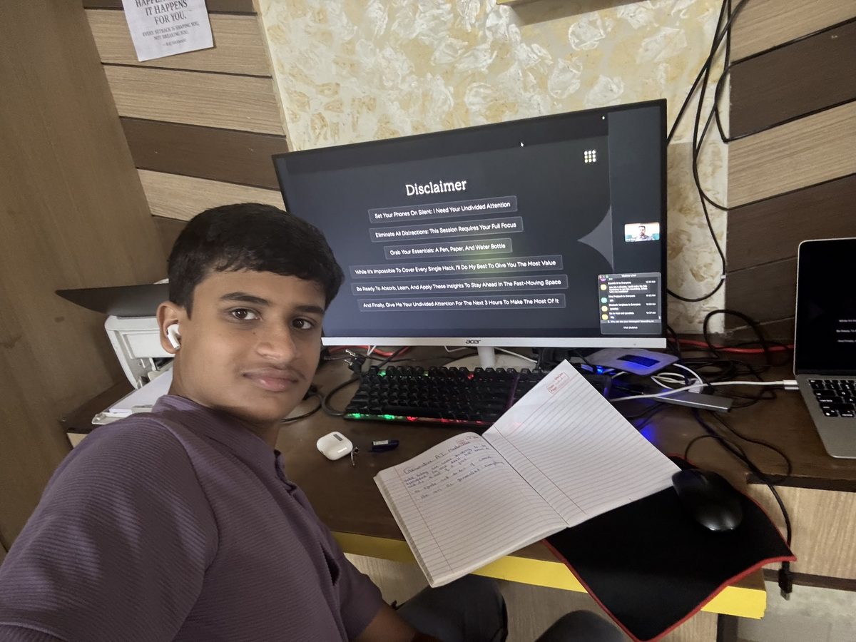 Ishan Jain at his desk, running an online session